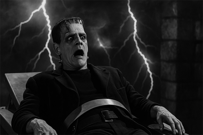 Ilustração da Criatura Frankstein despertando na mesa do laboratório, transmitindo a vertigem de uma consciência súbita e desorientada.